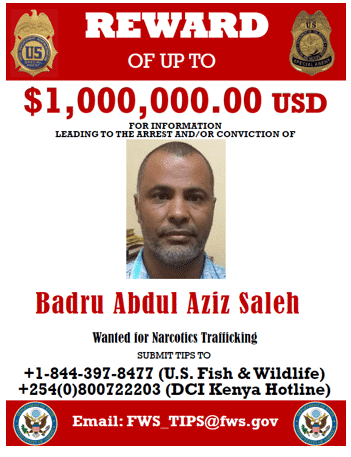 Poster showing a man's face and a reward amount of one million dollars.